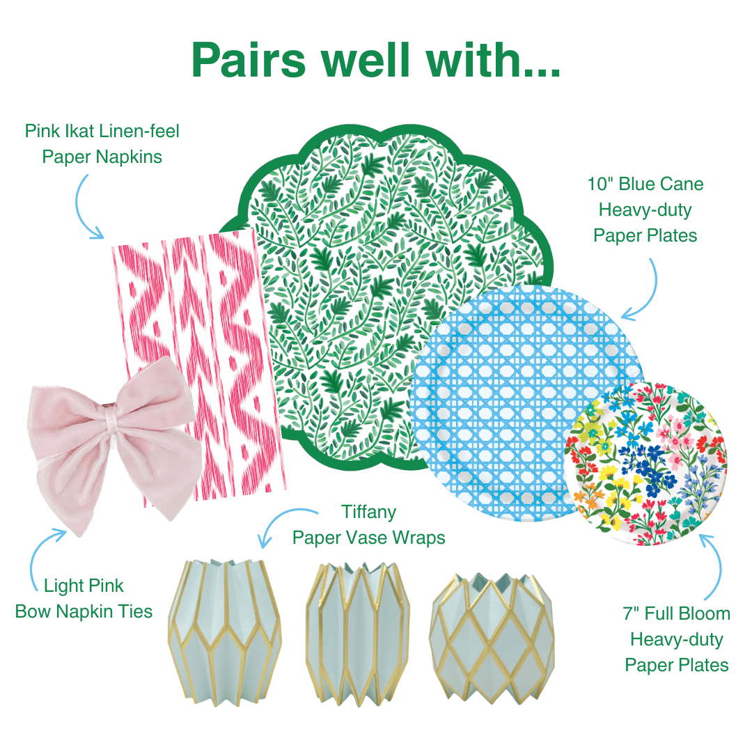 Pairs well with graphic showing six coordinating party products: Pink Ikat Linen-feel Paper Napkins in a pink and white ikat stripe pattern; Light Pink Bow Napkin Ties in soft pink velvet; Tiffany Paper Vase Wraps in pale blue with gold geometric lattice; a green and white botanical leaf print scallop-edged plate or charger; 10-inch Blue Cane Heavy-duty Paper Plates in light blue with a woven cane grid pattern; and 7-inch Full Bloom Heavy-duty Paper Plates with a colorful wildflower print