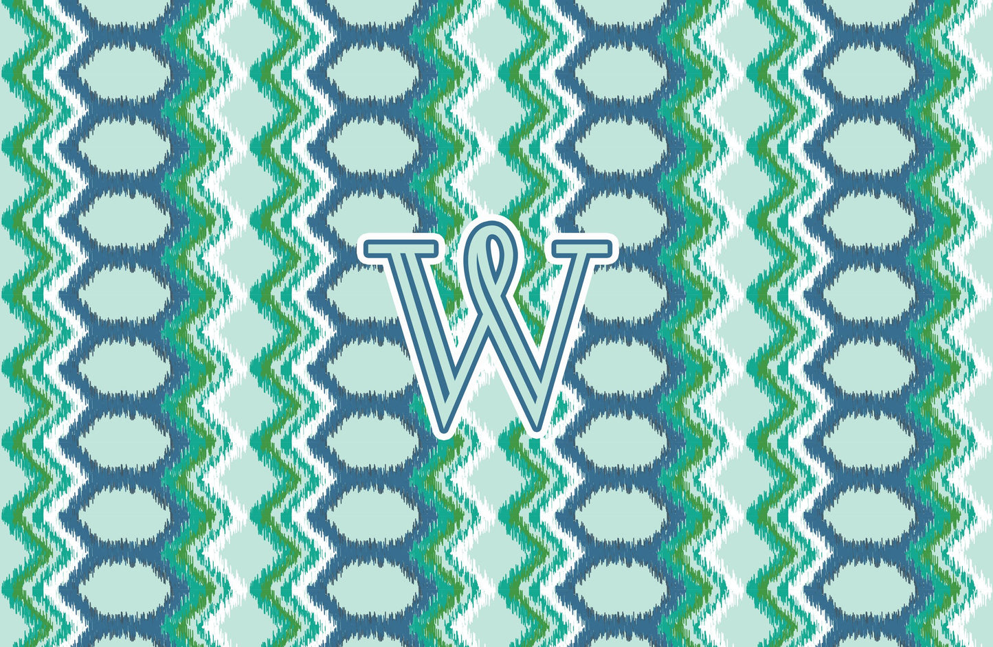 Paper placemat featuring a blue and green pattern with a teal personalized initial