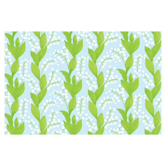 Pattern of green leaves and white flowers on a blue background