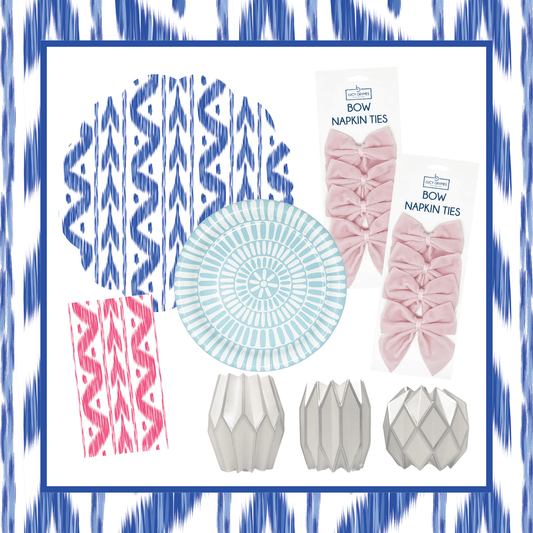 Set of decorative items including napkin ties, plates, and paper fans on a patterned background