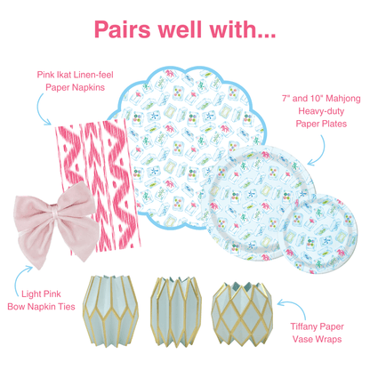 A style guide graphic featuring mahjong patterned paper placemats, mahjong patterned paper plates, pink ikat striped napkin, bow napkin tie and paper vases