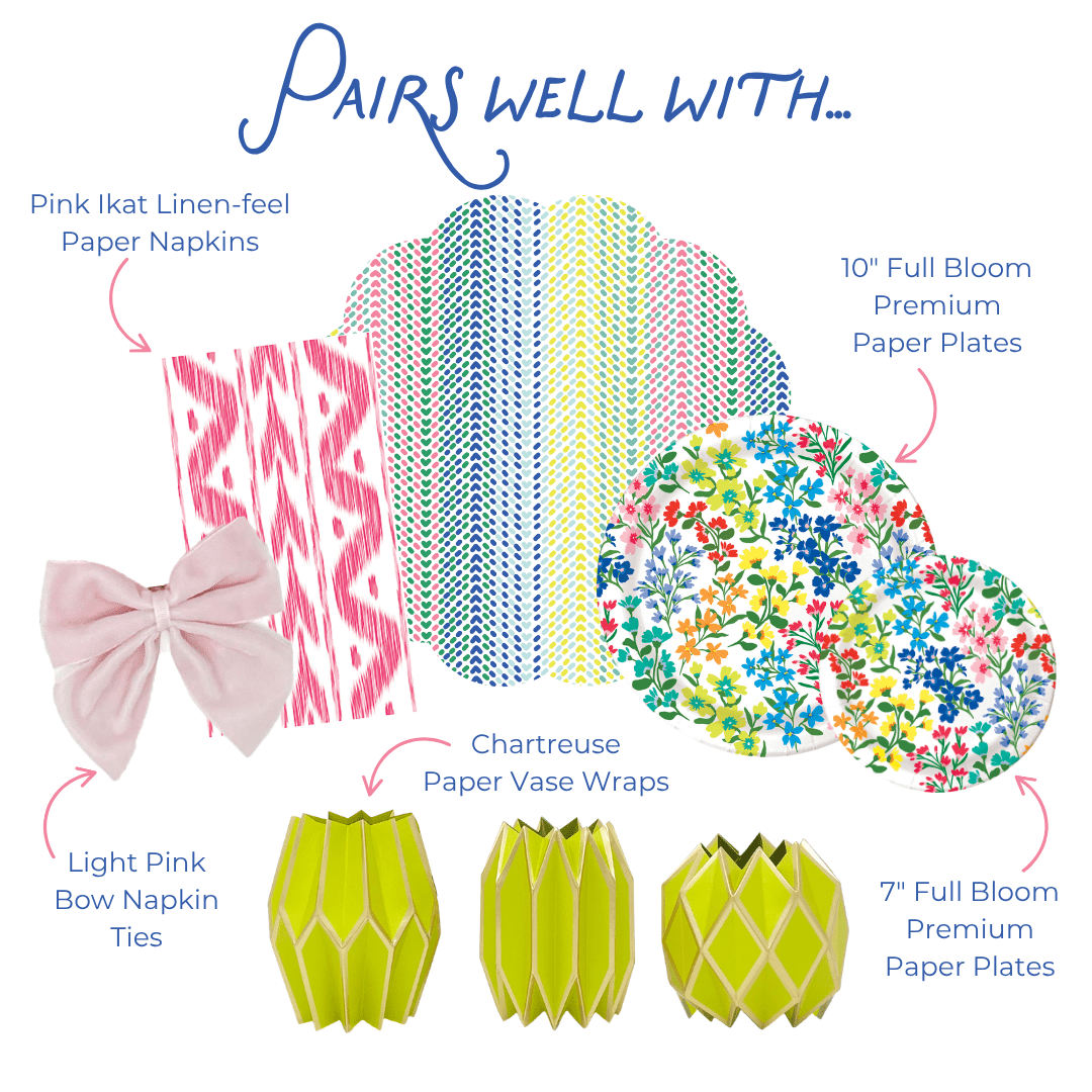 Product assortment with pink napkins, paper plates, bow ties, geometric paper vase wraps, and a colorful paper placemat on a white background.