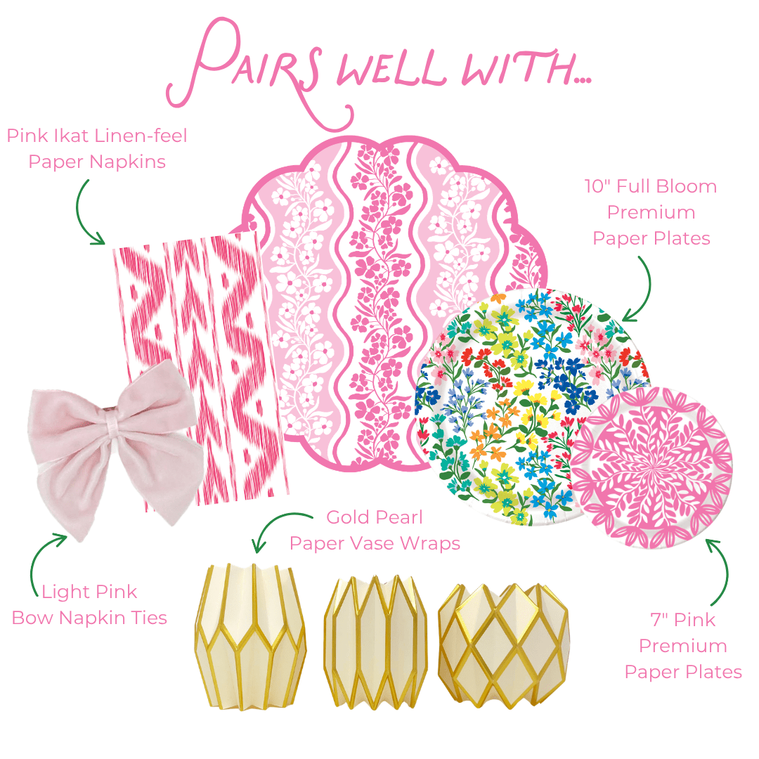 Graphic showing coordinated party tableware: pink ikat napkins with light pink bow ties, pink patterned placemat, floral and pink plates, and gold paper and pearlescent vase wraps.