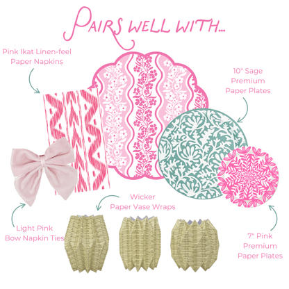 Product assortment with pink and green patterns including paper placemats, paper napkins, paper plates, paper vase wraps, and bow ties on a white background.