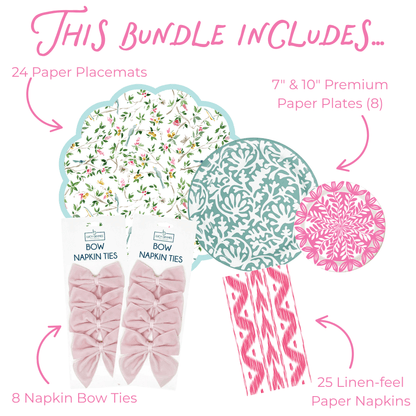 Infographic titled "This bundle includes..." showing 24 scalloped round watercolor bird and botanical-print paper placemats with a light blue border, 8 7-inch and 10-inch premium paper plates in teal floral medallion and pink floral medallion prints, 25 pink ikat linen-feel paper napkins, and 8 blush pink velvet bow napkin ties, labeled with pink arrows on a white background.