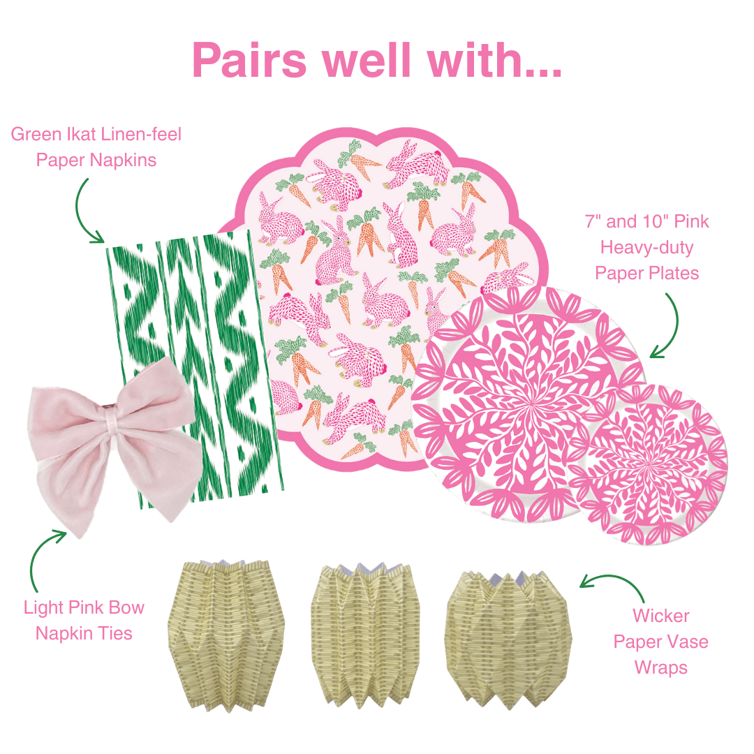 Graphic showing coordinating table decor items including green ikat-style paper napkins, pink floral and bunny-patterned paper plates, light pink bow napkin ties, and wicker-style paper vase wraps, labeled as items that pair well together.