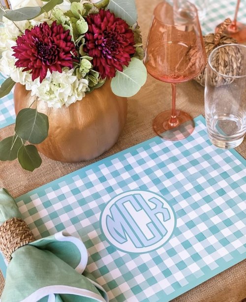 Fall table with monogrammed green gingham paper placemat