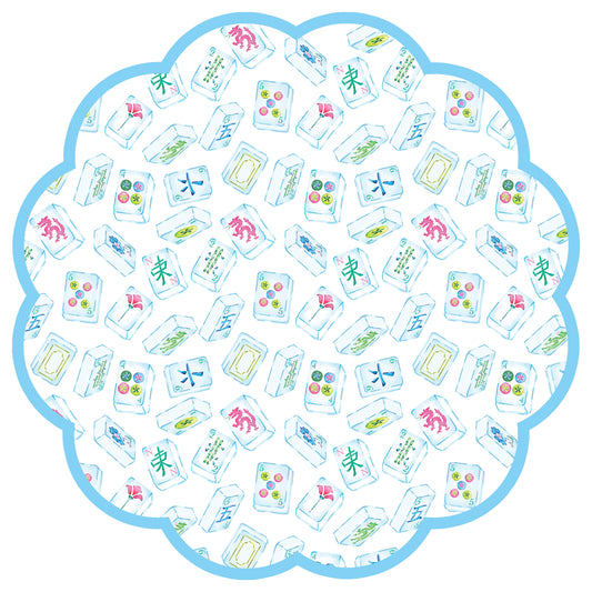 Blue scalloped paper placemat with mahjong tile designs on a white background