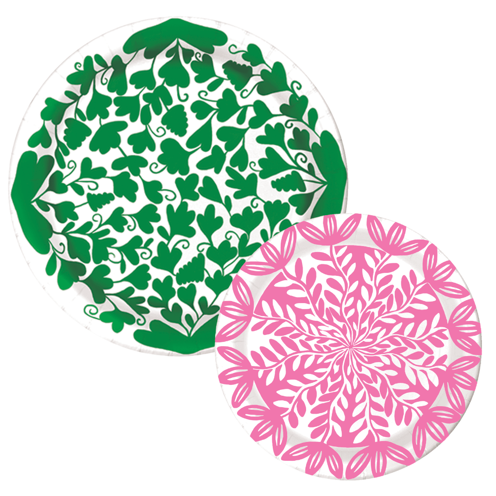 Two paper plates: a green ivy leaf-print dinner plate and a pink botanical leaf-print dessert plate