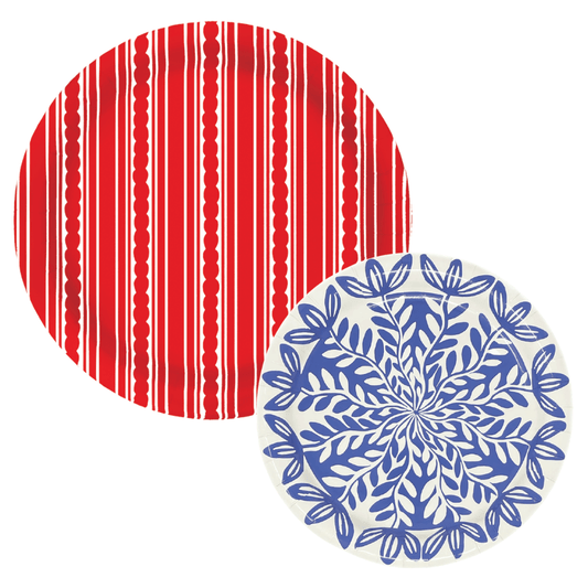 Red stripe patterned dinner paper plate and blue and white dessert paper plate on a white background