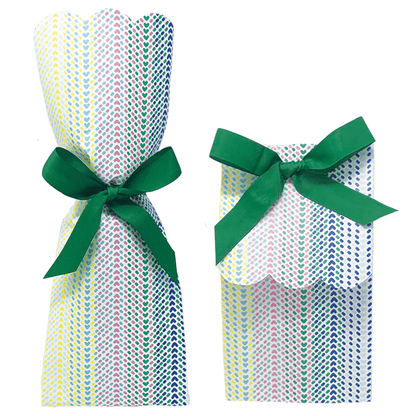 Two paper gift bag kits in a multicolor chevron arrow print, shown tied as a tall wine bag and a shorter gift bag, each with a green ribbon bow