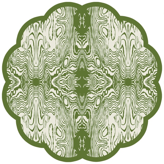 A scalloped paper placemat with a wood grain pattern in green and white colors