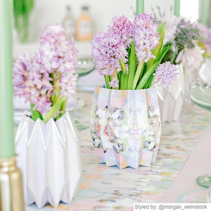 Brooks Avenue Paper Vases lined up on a table