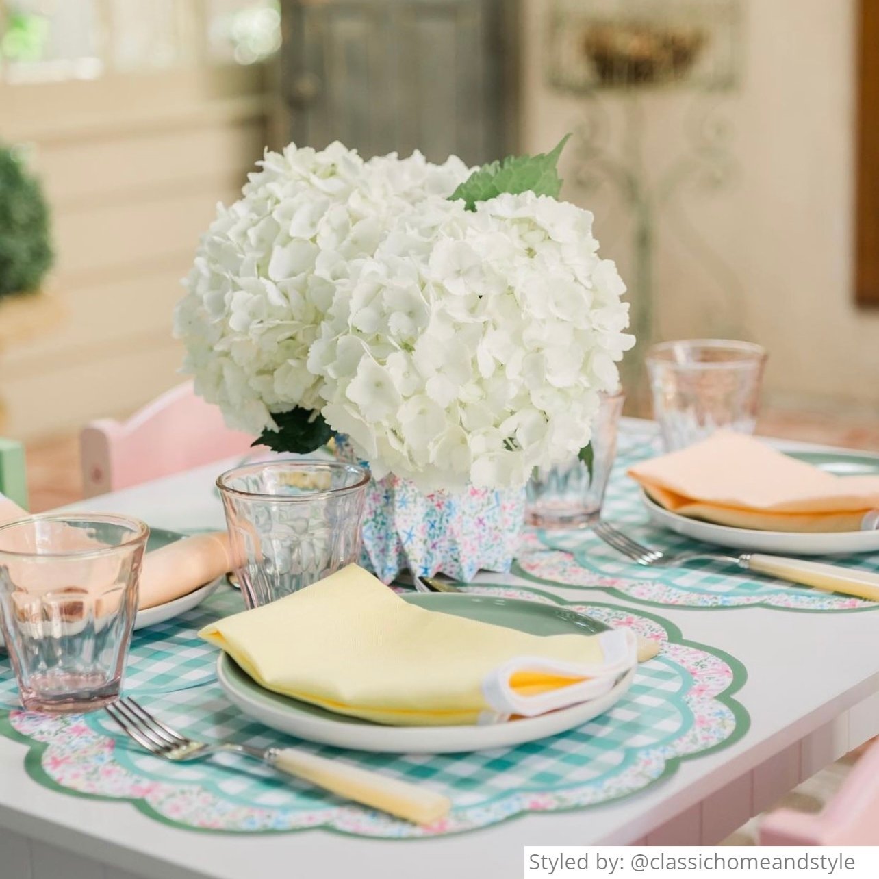 Spring table setting with paper placemats and paper vases