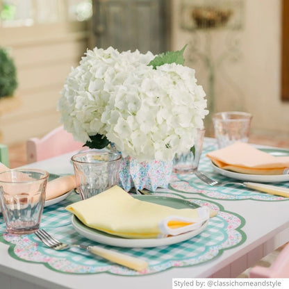 Spring table setting with paper placemats and paper vases