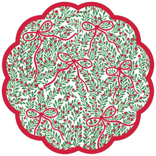 Round scalloped paper placemat featuring a green fern pattern with red bows and a red border