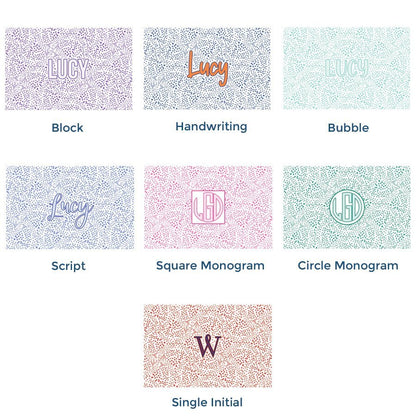 Paper placemat pads featuring a customizable dot pattern and various personalized name options
