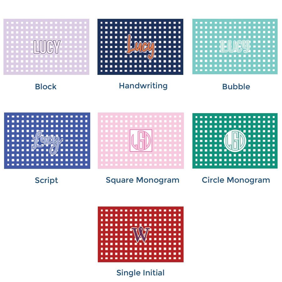 Paper placemat pads featuring a customizable plaid pattern and various personalized name options