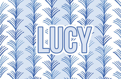 Paper placemat featuring a blue and white willow pattern with a personalized name in blue