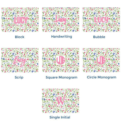Paper placemat pads featuring a floral pattern on a cream background with various pink personalization options