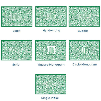 Paper placemat pads featuring a green vine pattern and various personalization options