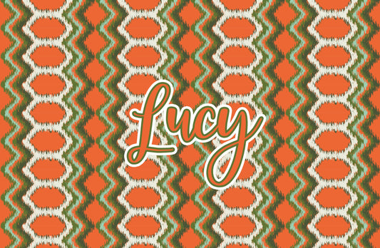 Paper placemat featuring a brown and orange pattern with an orange personalized name