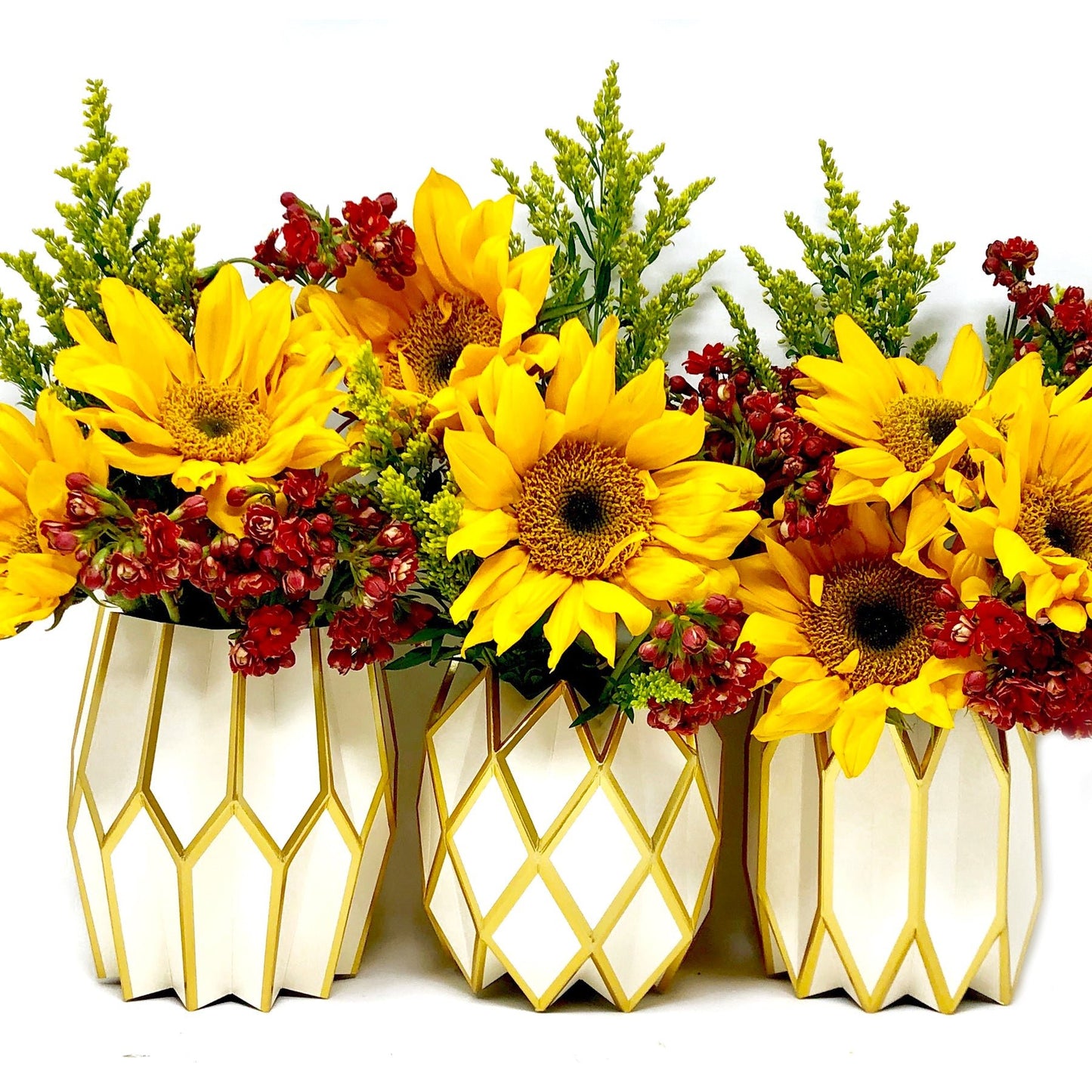 Gold and white paper vase sleeve centerpieces with fall flowers