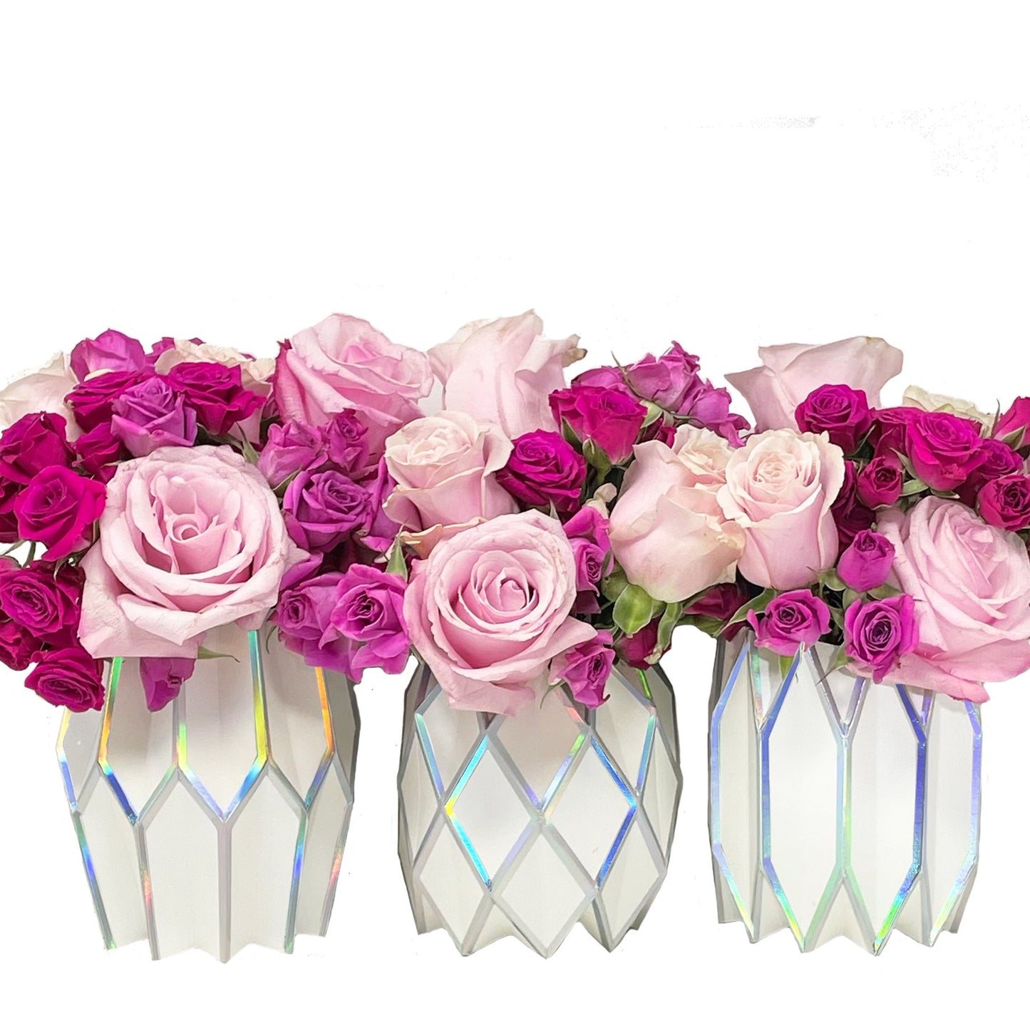 White paper vase with holographic accents and pink flowers