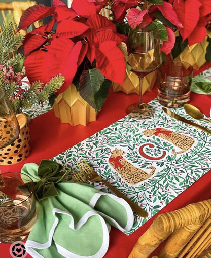 Table setting with a personalized leopard Christmas placemat