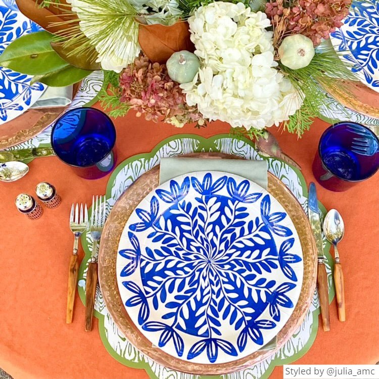 10 inch blue paper plate and green Wood scalloped paper placemat set with wooden tableware and floral arrangement