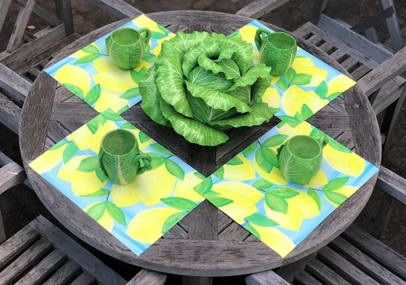 Lemon placemats on wooden picnic table