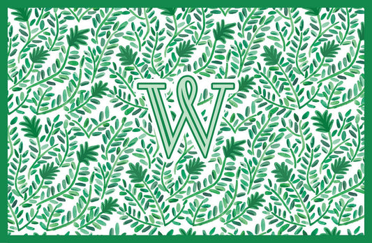 Paper placemat featuring a green vine pattern and a green personalized initial
