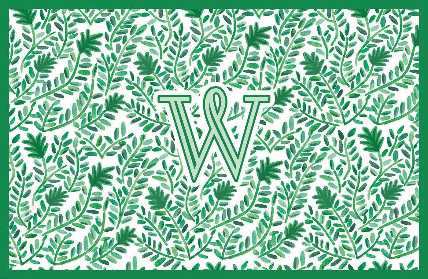 Paper placemat featuring a green vine pattern and a green personalized initial