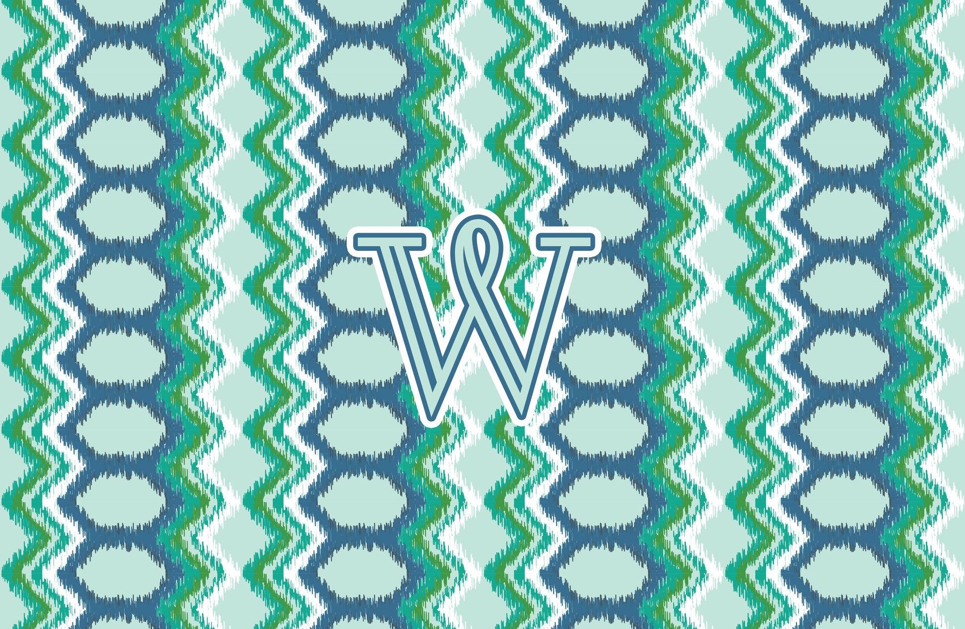 Paper placemat featuring a blue and green pattern with a teal personalized initial